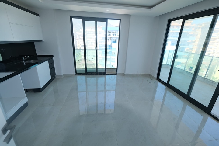 Квартира 1+1 на берегу моря в Махмутларе