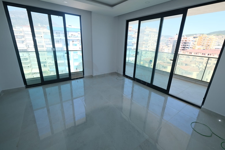 Квартира 1+1 на берегу моря в Махмутларе