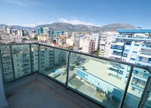 Квартира 1+1 на берегу моря в Махмутларе