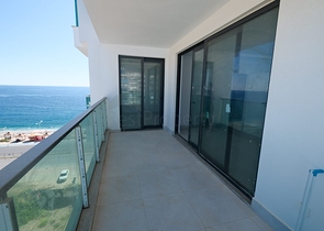 Квартира 1+1 на берегу моря в Махмутларе