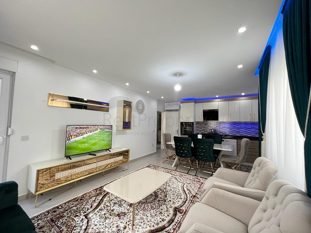 Меблированная трехкомнатная квартира в Махмутларе 