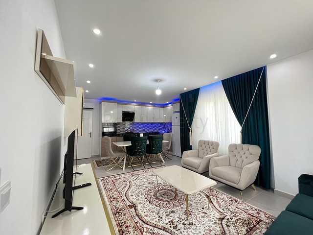 Меблированная трехкомнатная квартира в Махмутларе 