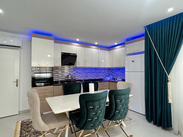 Меблированная трехкомнатная квартира в Махмутларе 