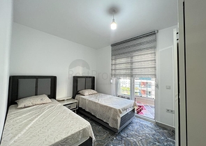 Меблированная трехкомнатная квартира в Махмутларе 