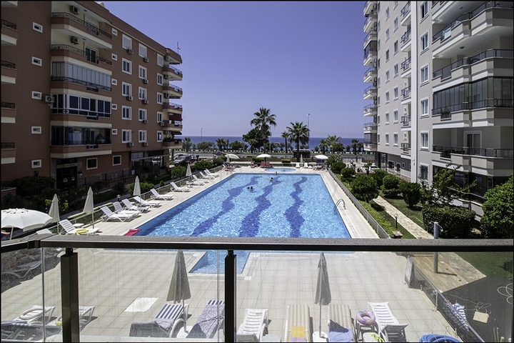 Просторная квартира 2+1 в Махмутларе на берегу моря Просторная квартира 2+1 в Махмутларе на берегу моря