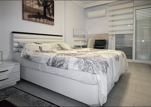 Просторная квартира 2+1 в Махмутларе на берегу моря Просторная квартира 2+1 в Махмутларе на берегу моря