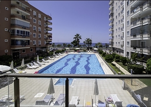 Просторная квартира 2+1 в Махмутларе на берегу моря Просторная квартира 2+1 в Махмутларе на берегу моря