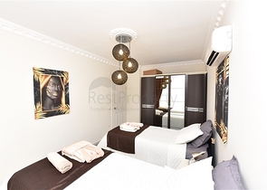 Трехкомнатная квартира с мебелью в районе Джикджилли