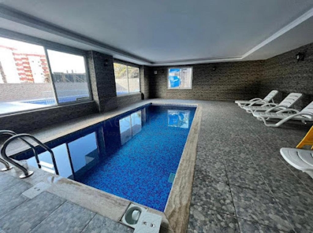 Двухкомнатная квартира в районе Махмутлар