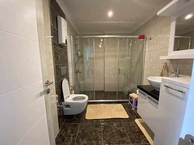 Двухкомнатная квартира в районе Махмутлар