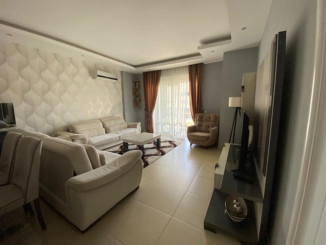 Двухкомнатная квартира в районе Махмутлар