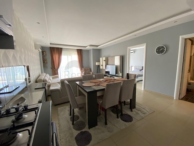 Двухкомнатная квартира в районе Махмутлар