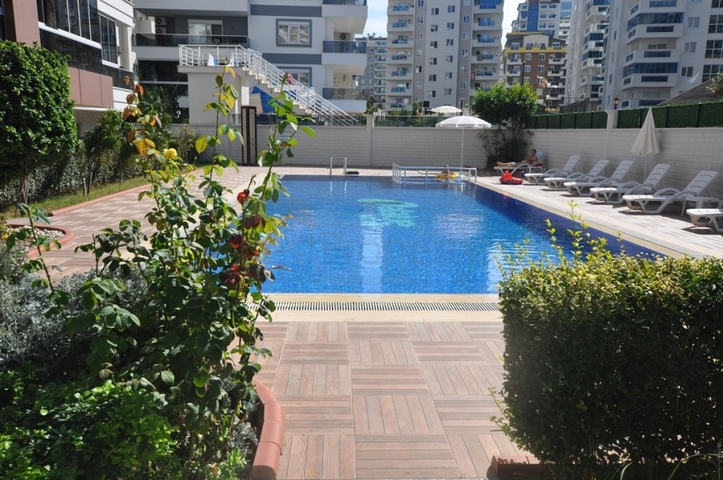 Двухкомнатная квартира в районе Махмутлар