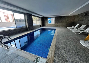 Двухкомнатная квартира в районе Махмутлар