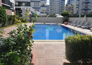 Двухкомнатная квартира в районе Махмутлар