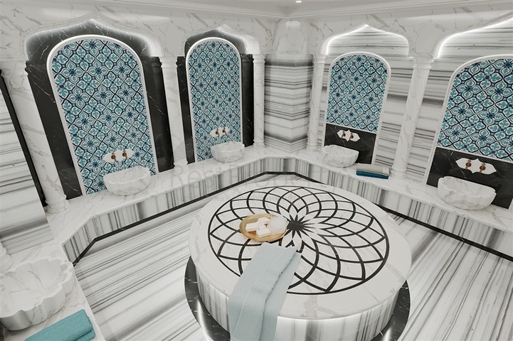 Квартира планировкой 1+1 в современном доме в районе Махмутлар