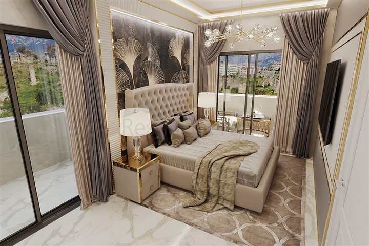 Квартира планировкой 1+1 в современном доме в районе Махмутлар