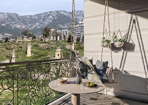 Квартира планировкой 1+1 в современном доме в районе Махмутлар