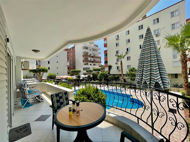 Трехкомнатная квартира в районе Махмутлар