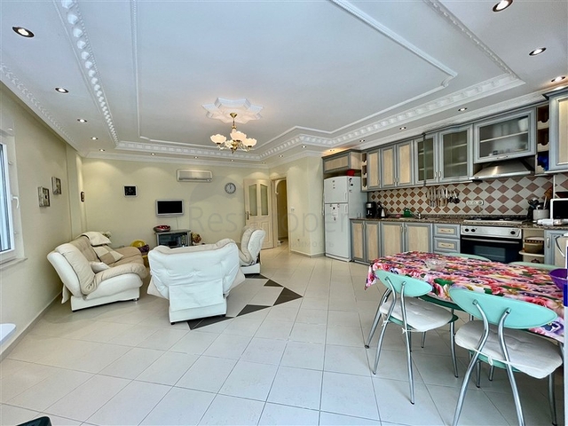 Трехкомнатная квартира в районе Махмутлар