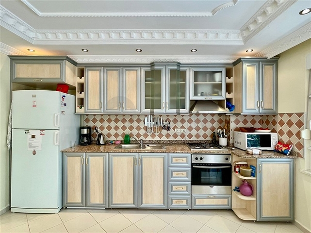 Трехкомнатная квартира в районе Махмутлар