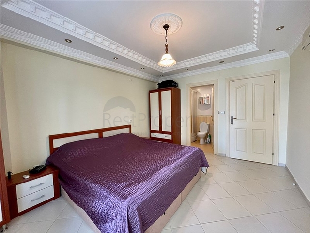 Трехкомнатная квартира в районе Махмутлар