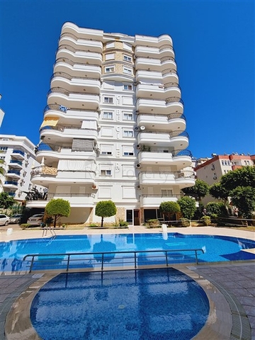 Трехкомнатная квартира в районе Махмутлар