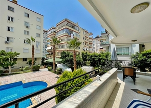 Трехкомнатная квартира в районе Махмутлар