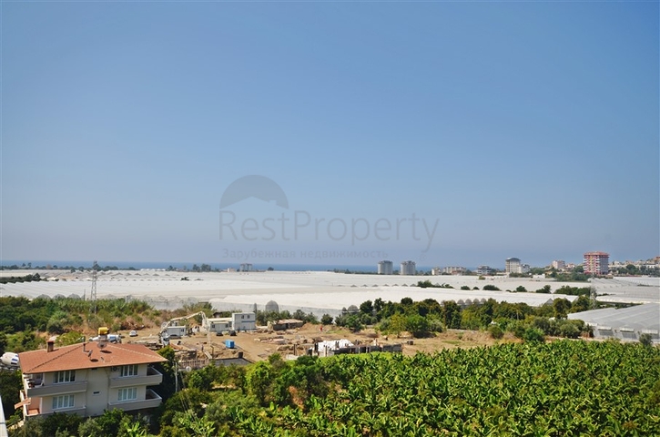 Двухуровневый пентхаус с видом на море в районе Демирташ