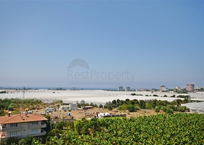 Двухуровневый пентхаус с видом на море в районе Демирташ