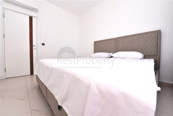 Трехкомнатную меблированную квартиру в районе Каргыджак