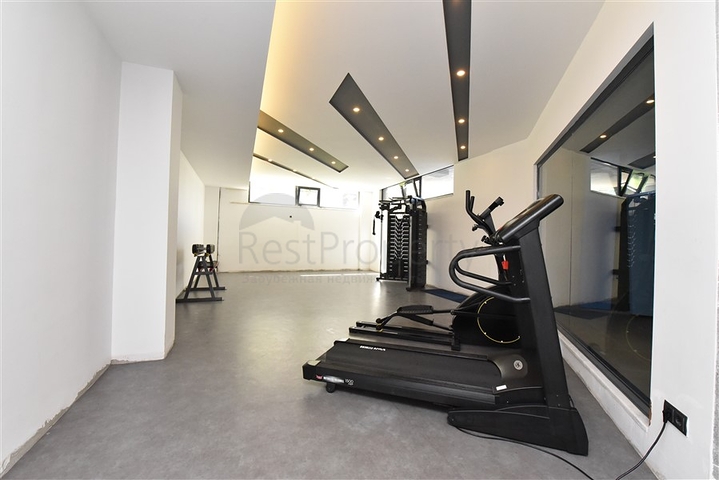 Трехкомнатную меблированную квартиру в районе Каргыджак