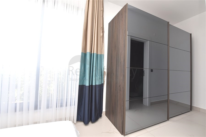 Трехкомнатную меблированную квартиру в районе Каргыджак