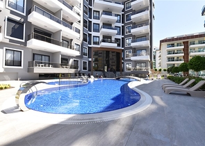 Трехкомнатную меблированную квартиру в районе Каргыджак