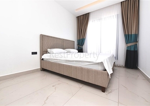 Трехкомнатную меблированную квартиру в районе Каргыджак