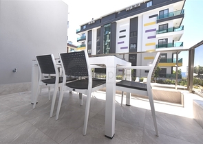 Трехкомнатную меблированную квартиру в районе Каргыджак