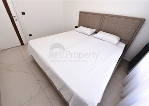 Трехкомнатную меблированную квартиру в районе Каргыджак