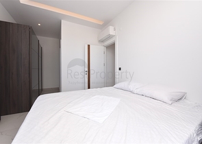 Трехкомнатную меблированную квартиру в районе Каргыджак