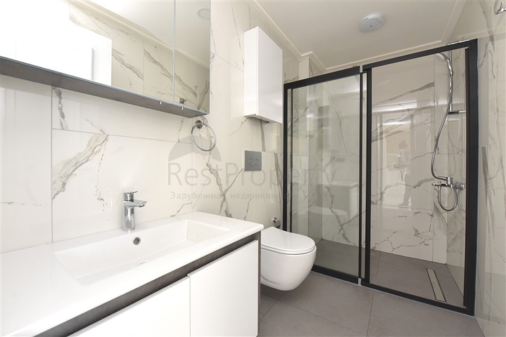 Квартира 1+1 в новом комплексе в центре Алании