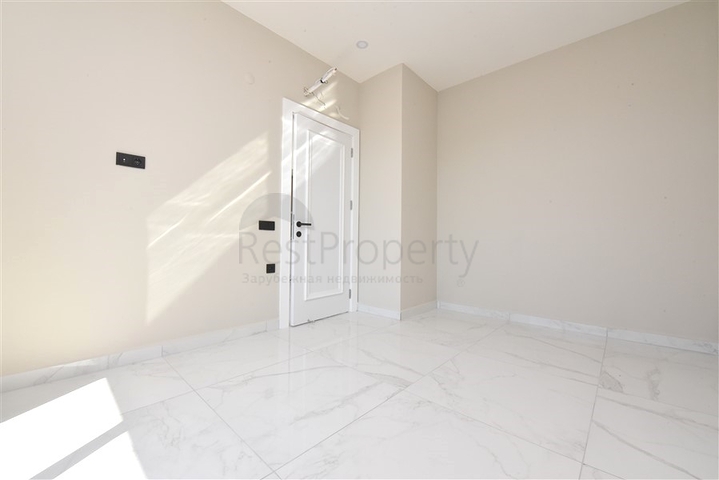 Квартира 1+1 в новом комплексе в центре Алании