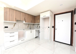 Квартира 1+1 в новом комплексе в центре Алании