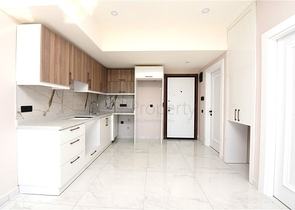 Квартира 1+1 в новом комплексе в центре Алании