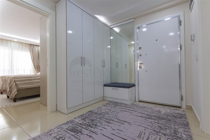 Трехкомнатная квартира в Махмутларе 