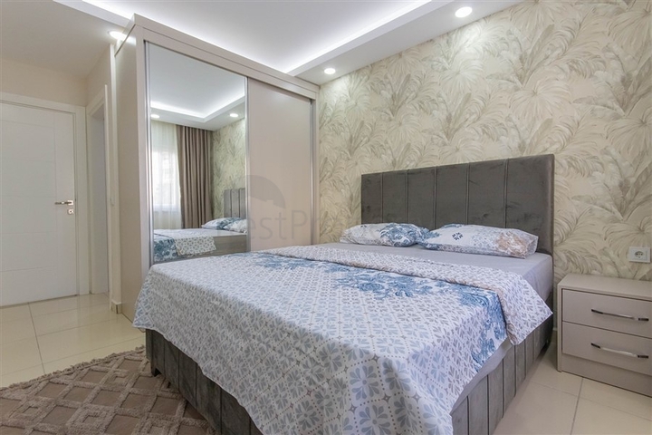 Трехкомнатная квартира в Махмутларе 