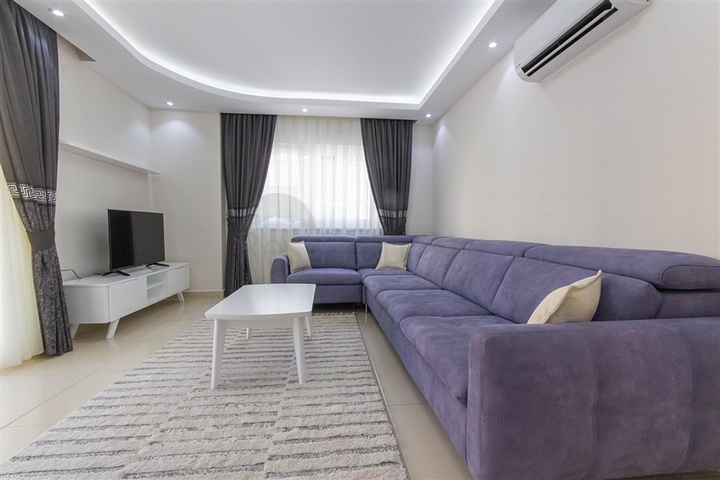 Трехкомнатная квартира в Махмутларе 