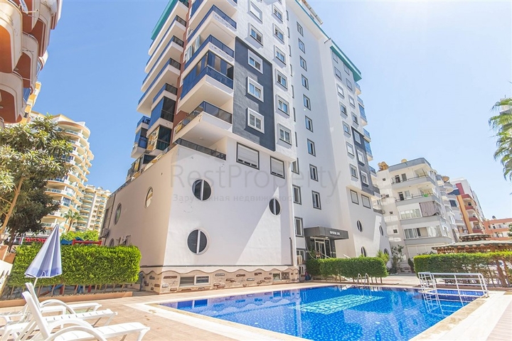 Трехкомнатная квартира в Махмутларе 