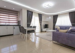 Трехкомнатная квартира в Махмутларе 