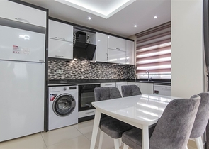 Трехкомнатная квартира в Махмутларе 