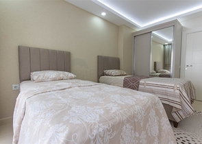 Трехкомнатная квартира в Махмутларе 