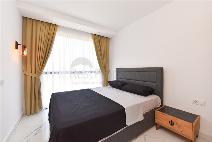 Квартира планировки 1+1 в новом комплексе в районе Махмутлар